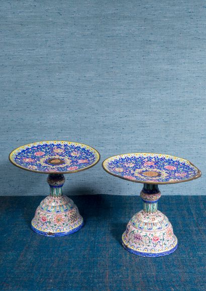 Pair of cups on pedestal, in enamels of the...