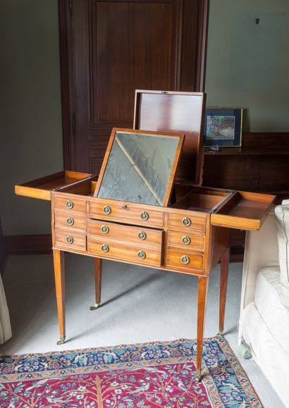 null Veneer dressing table opening to 8 drawers, the tray discovering a mirror and...