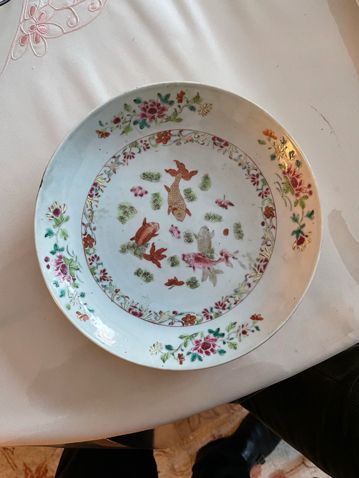 Two porcelain plates of China, one decorated...