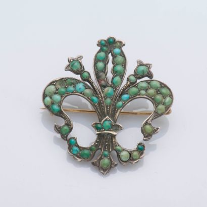 null Broche fleur de lys en or jaune 9 carats (375 ‰) entièrement sertie de cabochons...