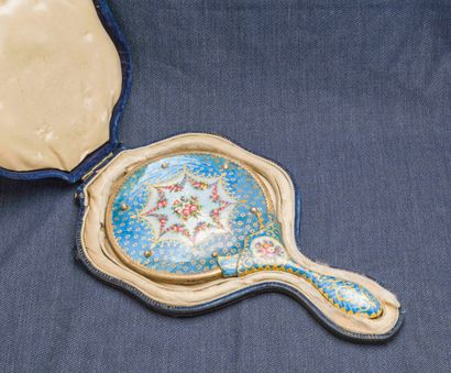 null Gilt metal hand mirror entirely covered with translucent blue enamel, enhanced...