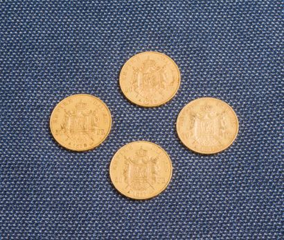  Lot de 4 pièces de 50 francs or Napoléon III de 1855(3) et 1857. 
Poids : 64,4 ...