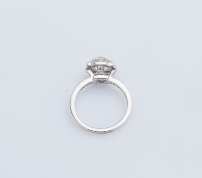 null Solitaire ring in platinum (950 thousandths) set with a cushion-shaped diamond...