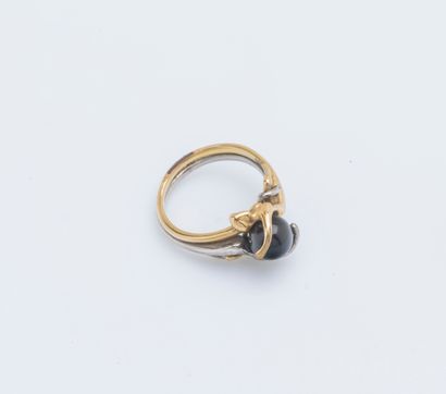 null Charles Jourdan ring in metal decorated with a black glass ball. 

Finger size...