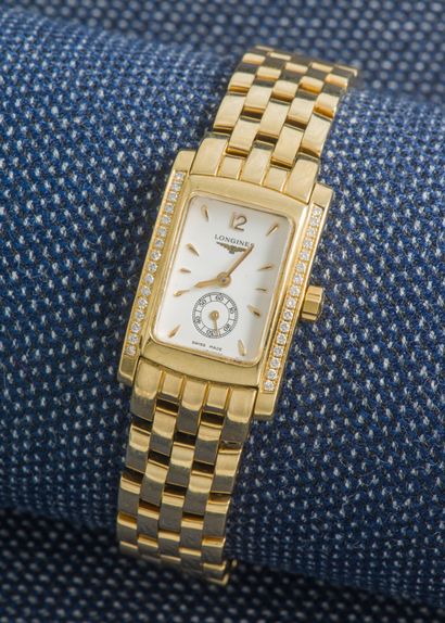 LONGINES Bracelet montre de dame modèle Dolce Vita en or jaune 18 carats (750 ‰),...