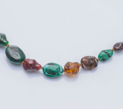 null Necklace double row of berlingots in green glass paste and amber, the clasp...