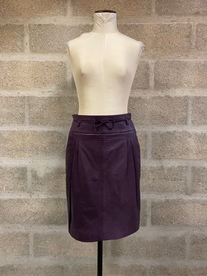 ESCADA - Grey virgin wool straight skirt, size 40 

- Leather skirt with purple stitching,...