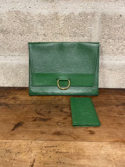 Louis Vuitton, Clutch bag model "Léna" in green leather, golden metal ring clasp...