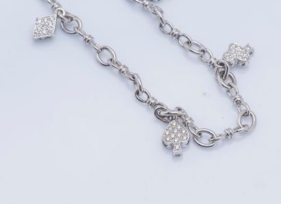 null 18K (750 ‰) white gold gourmette charm's bracelet with fancy mesh holding four...