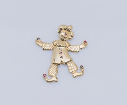 null 14K yellow gold pendant (585 ‰) featuring a clown with articulated limbs set...