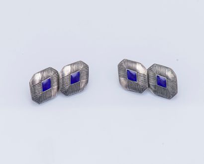 null Pair of silver (925 ‰) cufflinks in the shape of a diamond with cut sides with...