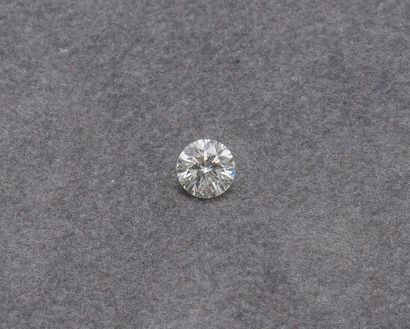 null Un diamant taillé en brillant pesant 0,72 carat.