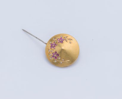 null Round and tapered 18K yellow gold (750 ‰) brooch set with cushion pink sapphires...