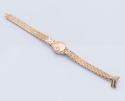JAEGER-LECOULTRE Bracelet montre de dame en or jaune 18 carats (750 ‰), le boitier...
