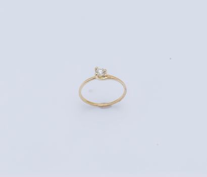 null Bague solitaire en or jaune 18 carats (750 ‰) sertie d'un diamant taillé en...