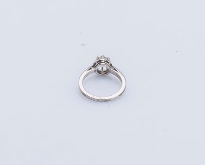 null Solitaire ring in 18K white gold (750 ‰) and platinum (950 ‰) adorned with an...