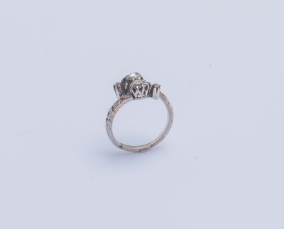 null A 9-karat (375 ‰) white gold toi et moi ring set with two rose-cut diamonds,...