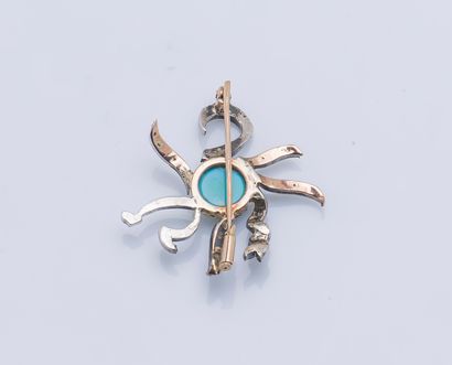 null Broche soleil en or jaune 18 carats (750 ‰) sertie d'un cabochon de turquoise...