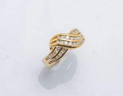 Ring band drawing a knot in yellow gold 18...