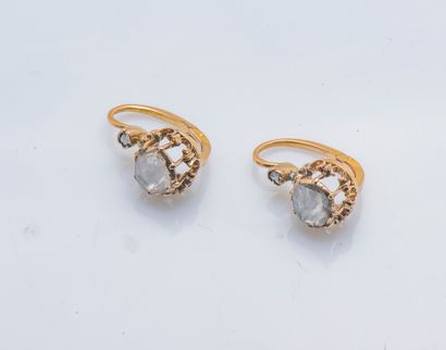 null Pair of 18K yellow gold (750 thousandths) sleepers set with rose-cut diamonds....
