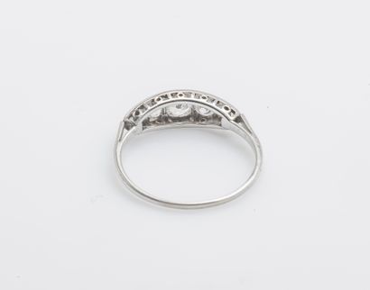null 
Garter ring in 18K white gold (750 thousandths) set with four old cut cushion...