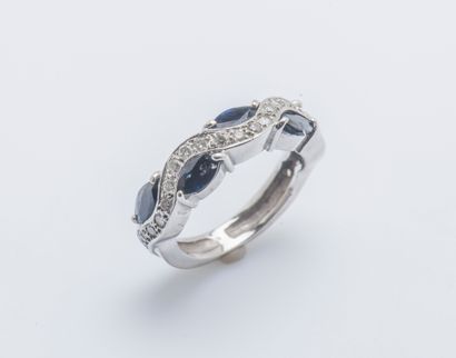 null Band ring in 18K white gold (750 thousandths) set with navette sapphires and...
