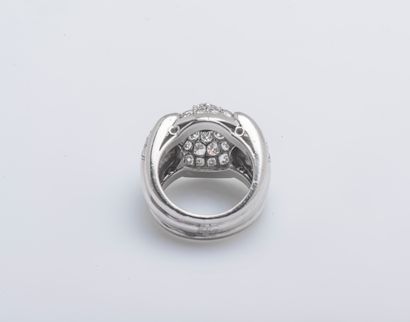 null Platinum (950 ‰) bridge ring forming a dome set with a brilliant-cut diamond...