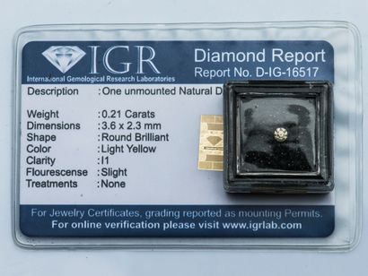 null A brilliant cut diamond weighing 0.21 carat with Light Yellow color, I1 clarity...