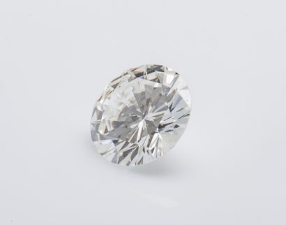 null Bague solitaire en or gris 18 carats (750 millièmes) sertie d'un diamant taillé...