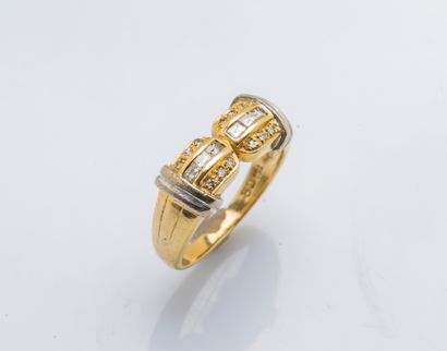 Yellow gold and white gold ring 18 carats...