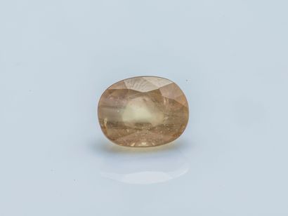 null Cushion sapphire on paper of yellow-beige color weighing 4.5 carats approxi...