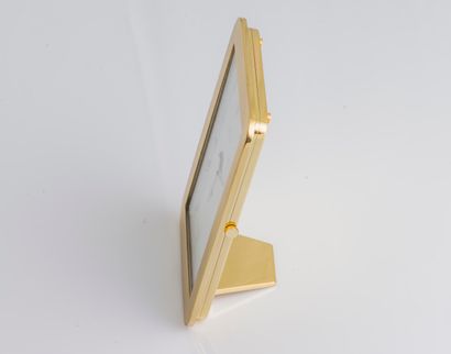 MAUBOUSSIN MAUBOUSSIN

Gilt metal desk clock of rectangular shape with screwed back,...