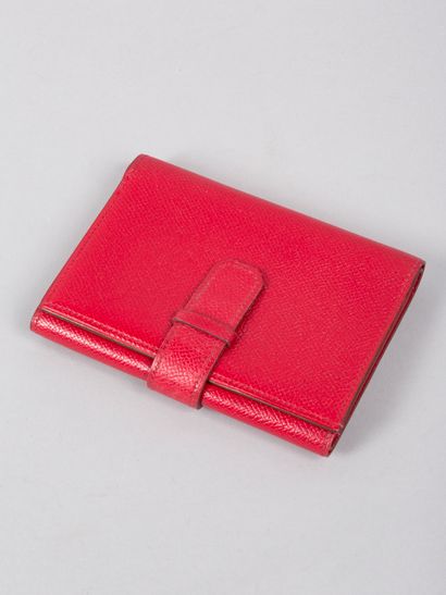 HERMES Paris HERMES Paris, 

Red grained leather wallet with handle closure 

Good...