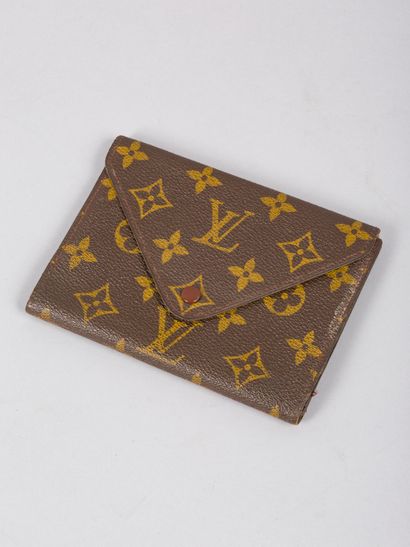 LOUIS VUITTON LOUIS VUITTON 

Wallet in monogram canvas and natural leather 

Condition...