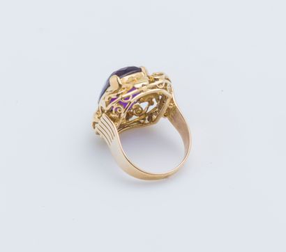null NOT SOLD
18K (750 ‰) yellow gold ring adorned with a cushion amethyst in a chased...