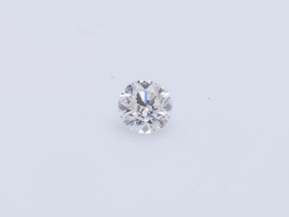 null A brilliant cut diamond on paper weighing 1.08 carats in G color and SI1 clarity,...