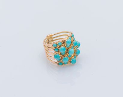 null Vermeil (925 ‰) multi-jewel ring formed of five rings set with turquoise cabochons.

Finger...