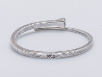 GUCCI Bracelet model Clou forming an opening ring in silver (925 thousandths). Signed...