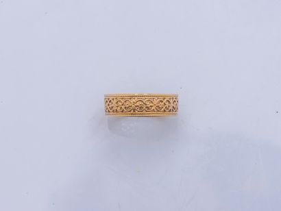 null Ring band in yellow gold 18 carats (750 thousandths) openwork of interlaces....