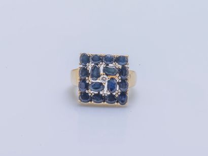 null Yellow gold ring 18 carats (750 thousandths) the bezel of square form set with...