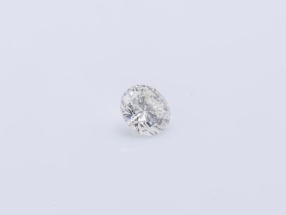 null A brilliant cut diamond on paper weighing 3.48 carats of J color purity VVS1,...