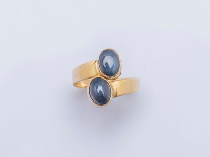 null Ring you and me in yellow gold 18 carats (750 thousandths) set with two cabochons...