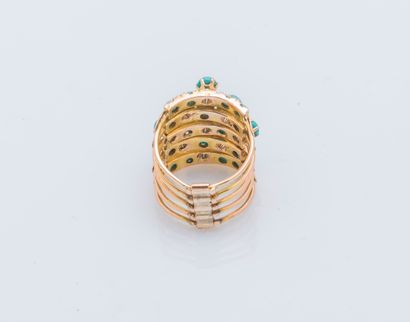 null Vermeil (925 ‰) multi-jewel ring formed of five rings set with turquoise cabochons.

Finger...