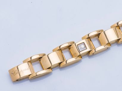 CHOPARD Happy Diamond bracelet in 18K gold (750 thousandths) tank shape with articulated...