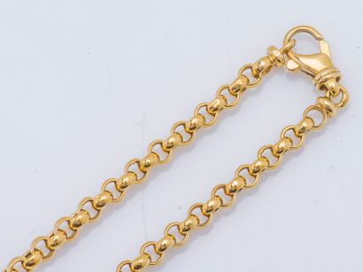 null Chain with broad mesh jaseron and pendant cross out of yellow gold 18 carats...