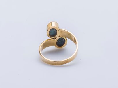 null Ring you and me in yellow gold 18 carats (750 thousandths) set with two cabochons...