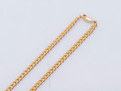 null Chain in yellow gold 18 carats (750 thousandths) with mesh gourmette, the faceted...