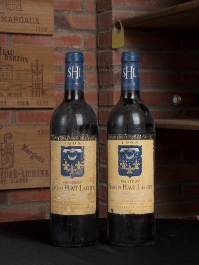 null 2 bouteilles Smith Haut Lafitte, Pessac Léognan, 1995 
Bon niveau 
Etiquettes...