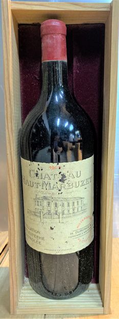 null 1 magnum Château Haut-Marbuzet, Saint-Estèphe, 1990 
Niveau bas goulot 
Etiquette...
