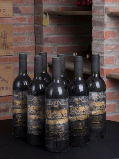 null 7 bottles Domaine de Rombeau, Cote du Roussillon, 1994 
Low level neck 
Damaged...